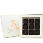 NINE DARK CHOCOLATE, GIANDUJA AND COCOA NIB PRALINES 85G